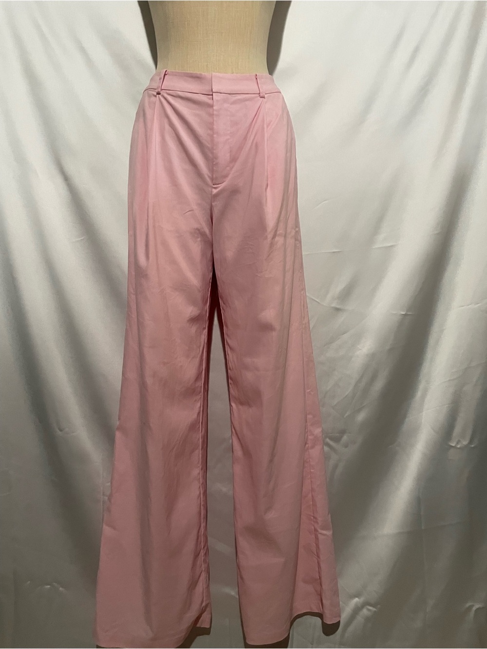 Elegant blush pink wide-leg trousers with fully lined tailored design